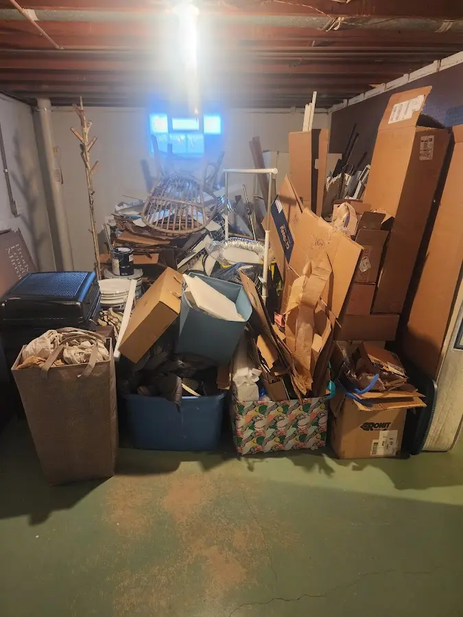 Roll-off dumpster container at job site for 4 Yard Dumpster Rental in Harrah